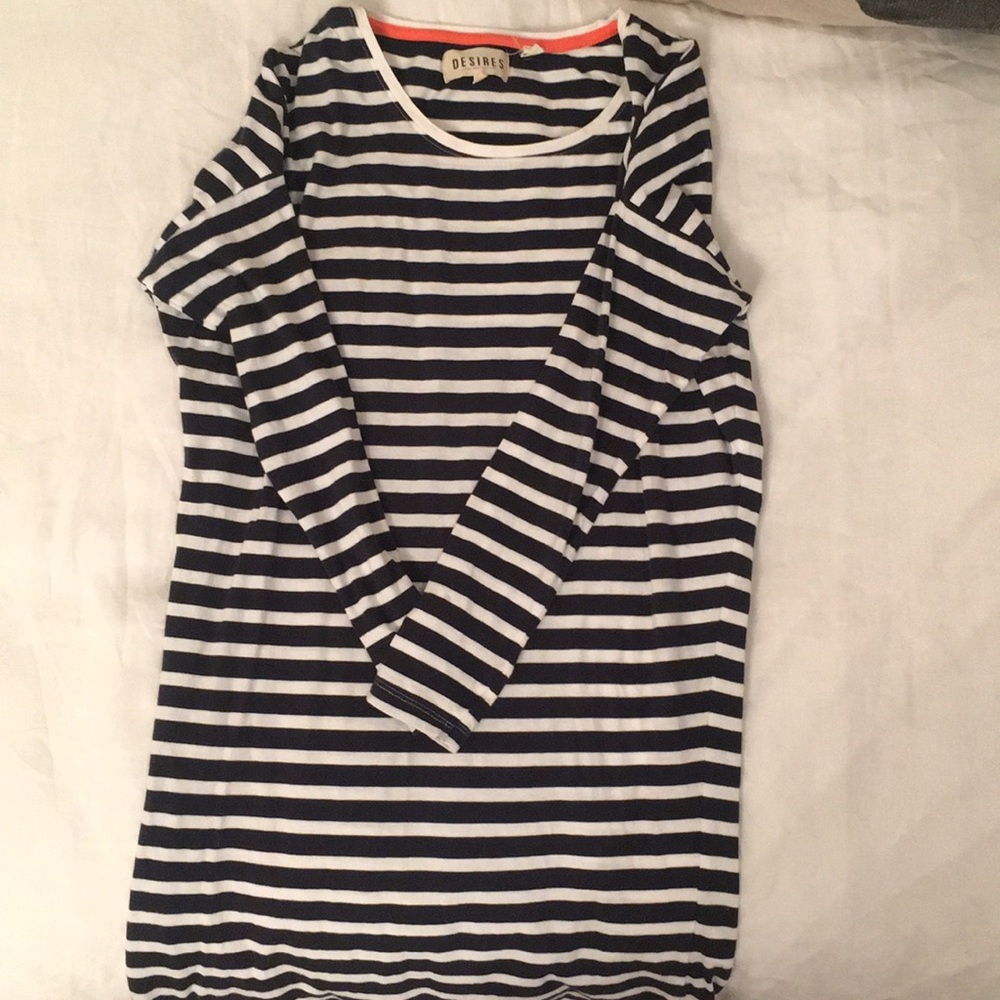 Blue and white striped tunic.